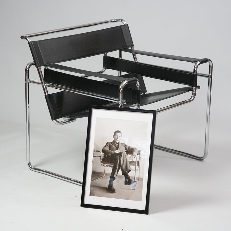 Chair with chromed frame, black leather seat and armrests. With the chair comes a painting of Breuer.