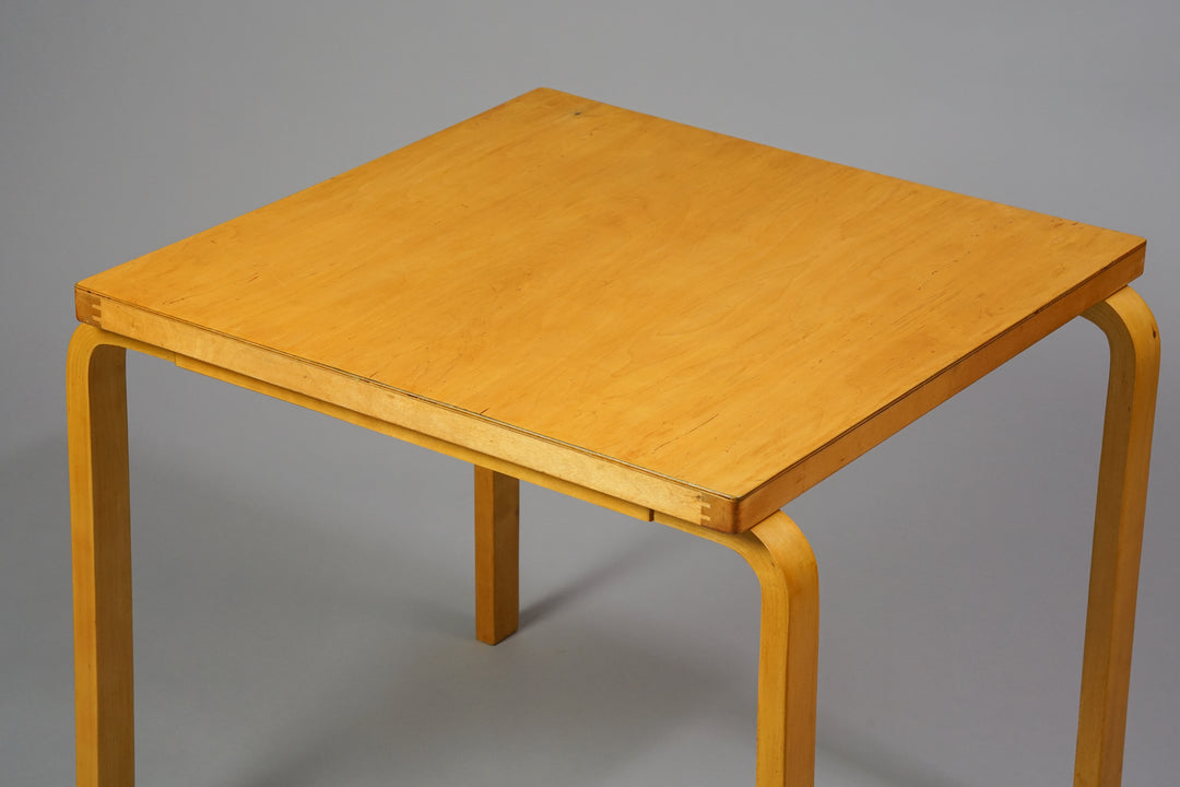 Simple square wooden table.