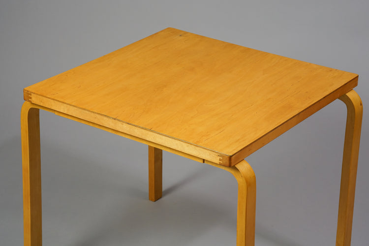 Simple square wooden table.