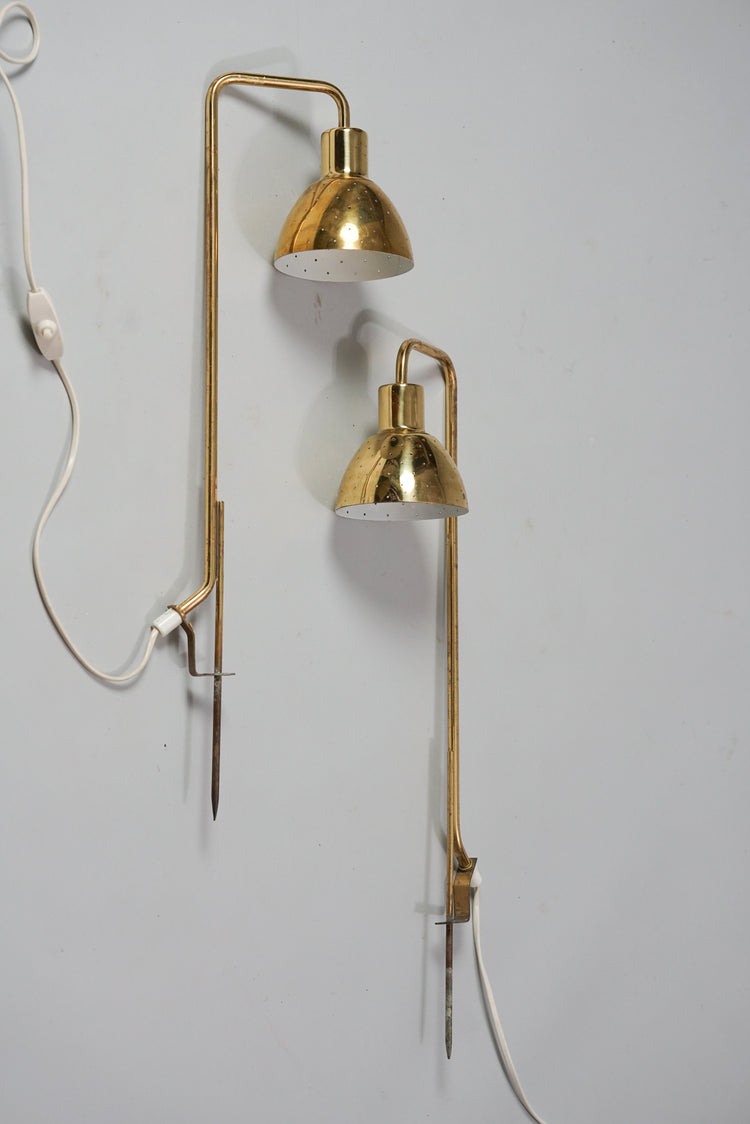 Two similar lamps made of brass with tiny holes on the shade as decoration. 