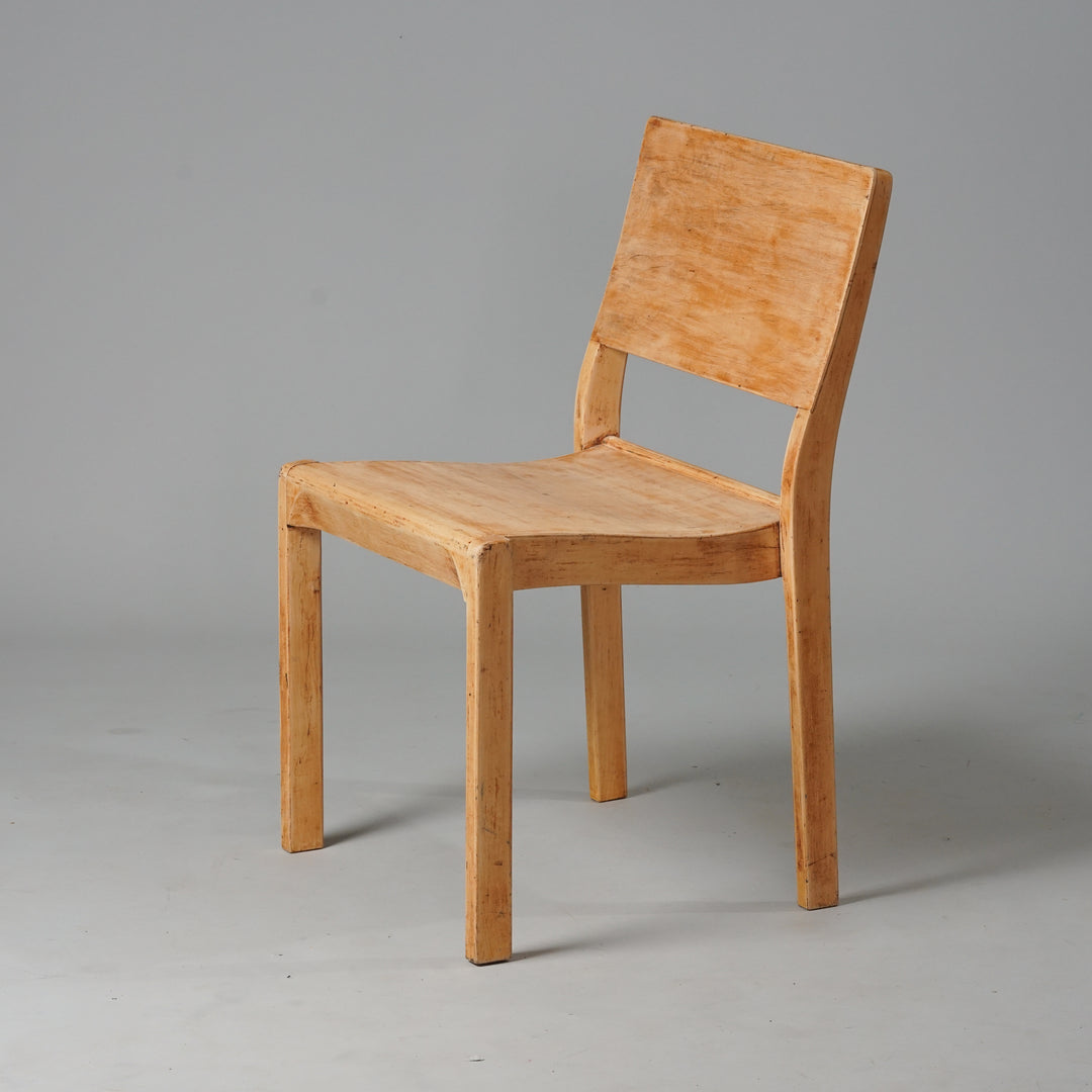 Simple vintage wooden chair with backrest.